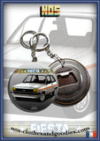 Badge / magnet / porte clé décapsuleur ford fiesta blanche 1980