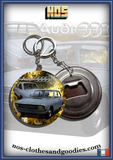 Badge / magnet / porte clé décapsuleur Audi 60 L bleu gris
